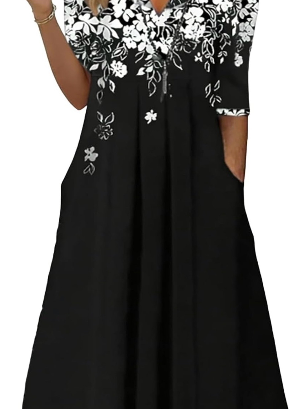 Black floral dress in packaging